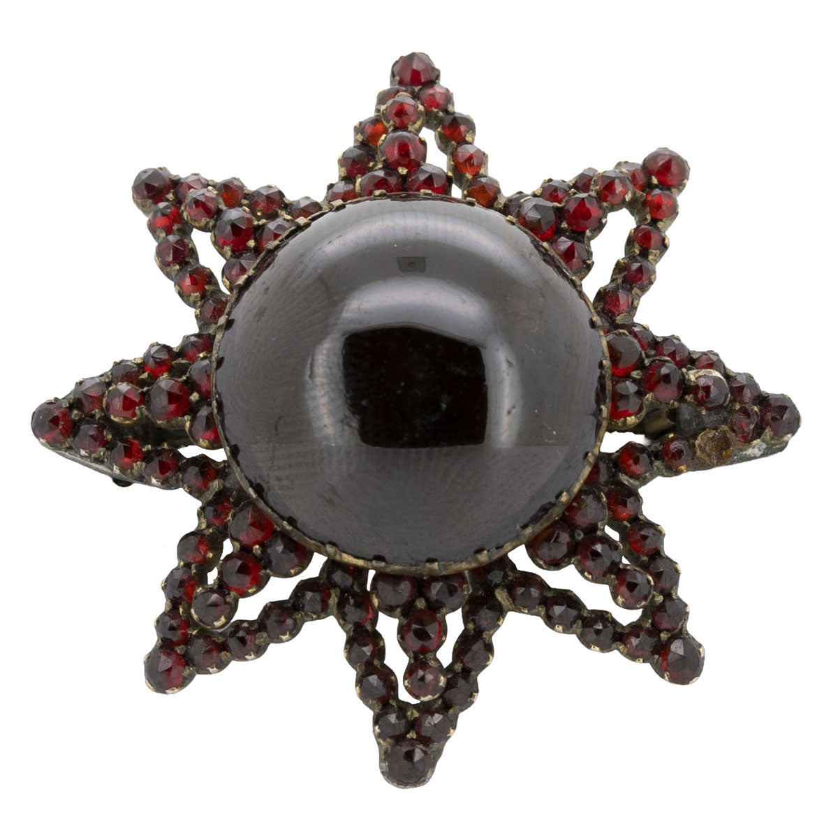 1219 – Antike böhmische Granat Brosche in Sternform aus Tombak – Biedermeier – um 1840
